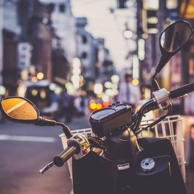Mobility Scooters looking out at a city